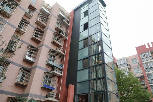 乐山老式楼梯加装电梯施工